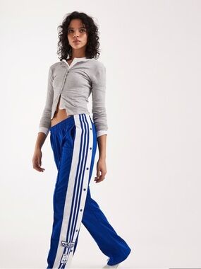 Adidas Blue Track Pants with Classic White Stripes
